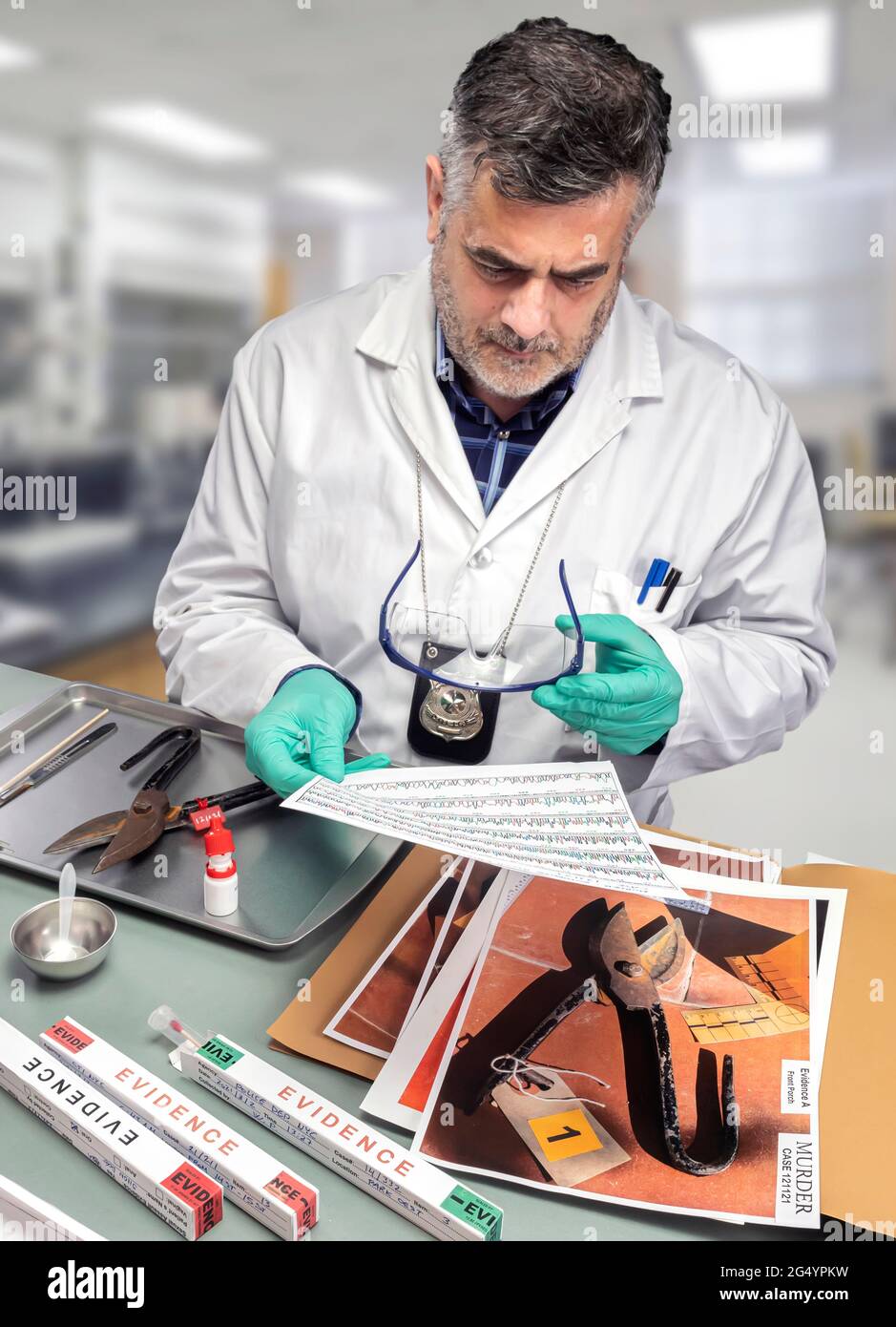 Police scientist checks chromatography analysis for traces of DNA on knife in crime lab, conceptual image Stock Photo