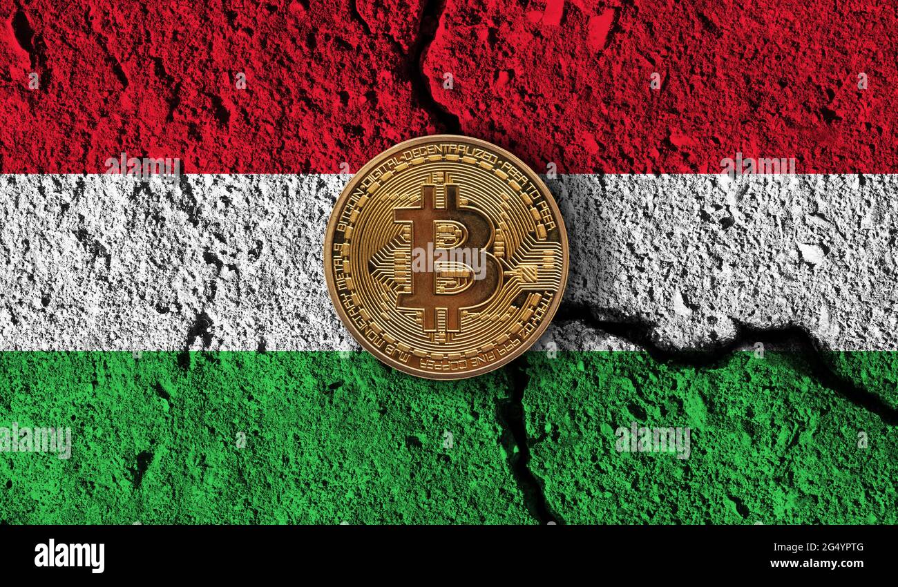 Bitcoin crypto currency coin with cracked Hungary flag. Crypto restrictions  Stock Photo - Alamy