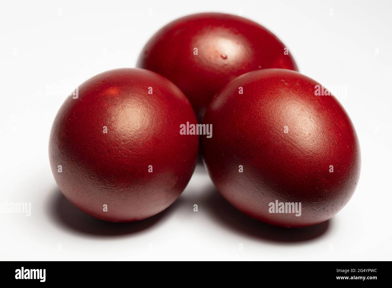 Classic easter eggs painted with onion peel close-up on a white background Stock Photo