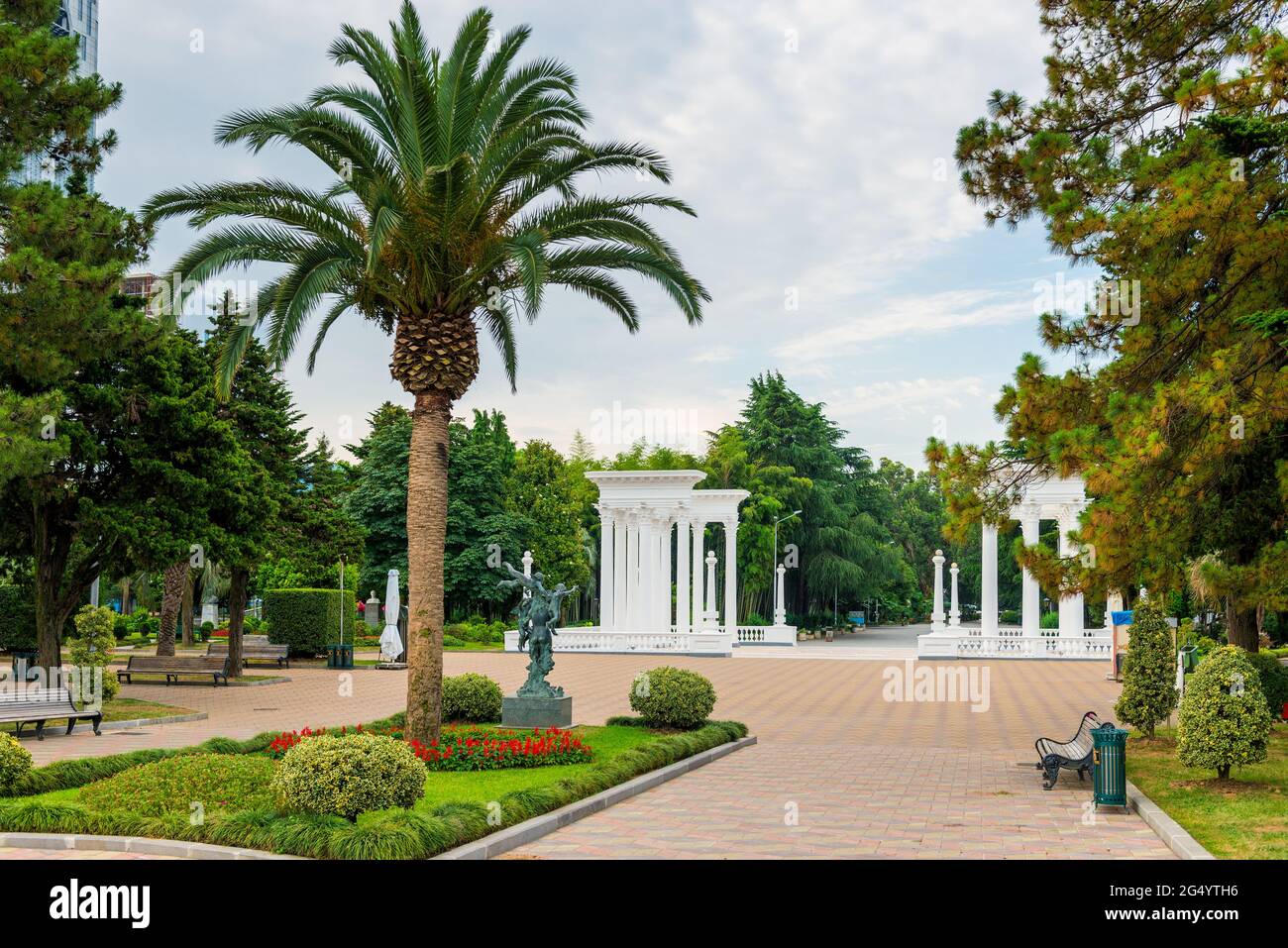 Trees and flowers in the park on the boulevard in Batumi. Stock Photo