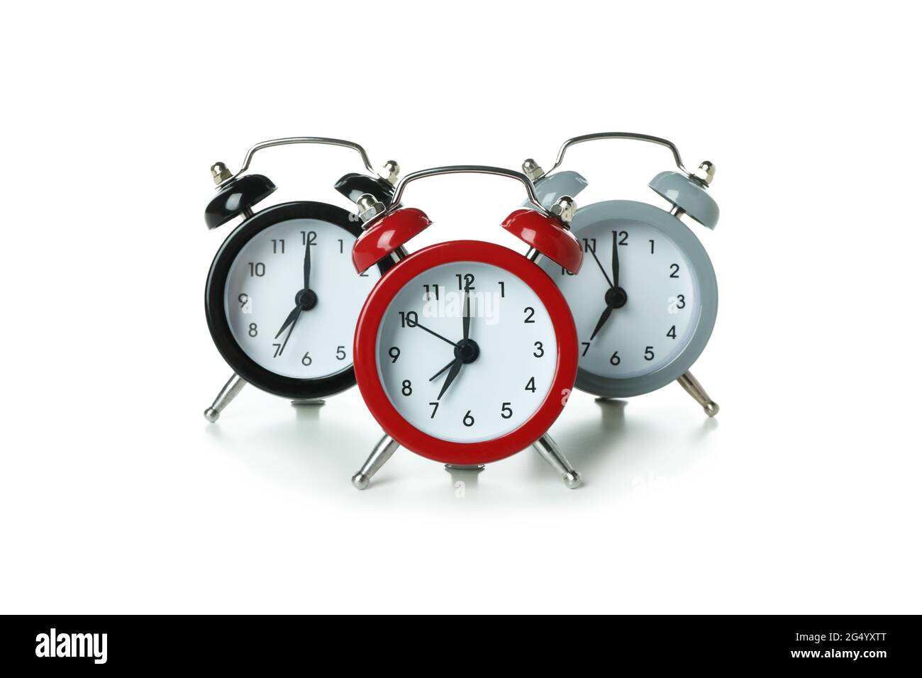 Three alarm clocks isolated on white background Stock Photo Alamy