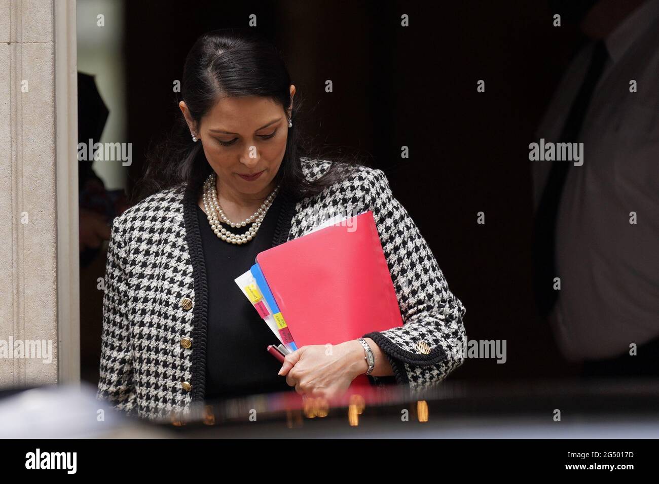 Home Secretary Priti Patel leaves 10 Downing Street, Westminster, ahead of an expected update from the Government on green list destinations for overseas travel. Picture date: Thursday June 24, 2021. Stock Photo
