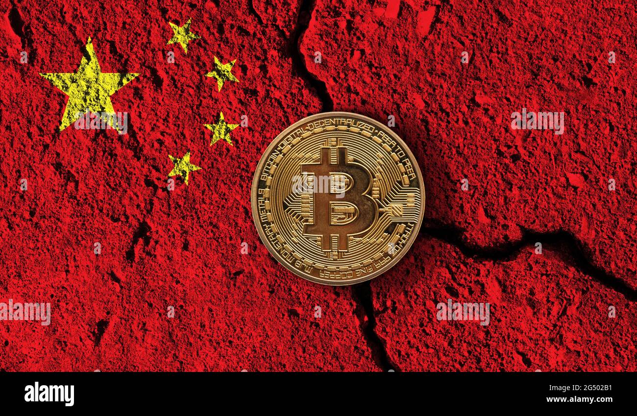 Bitcoin crypto currency coin with cracked China flag. Crypto restrictions Stock Photo