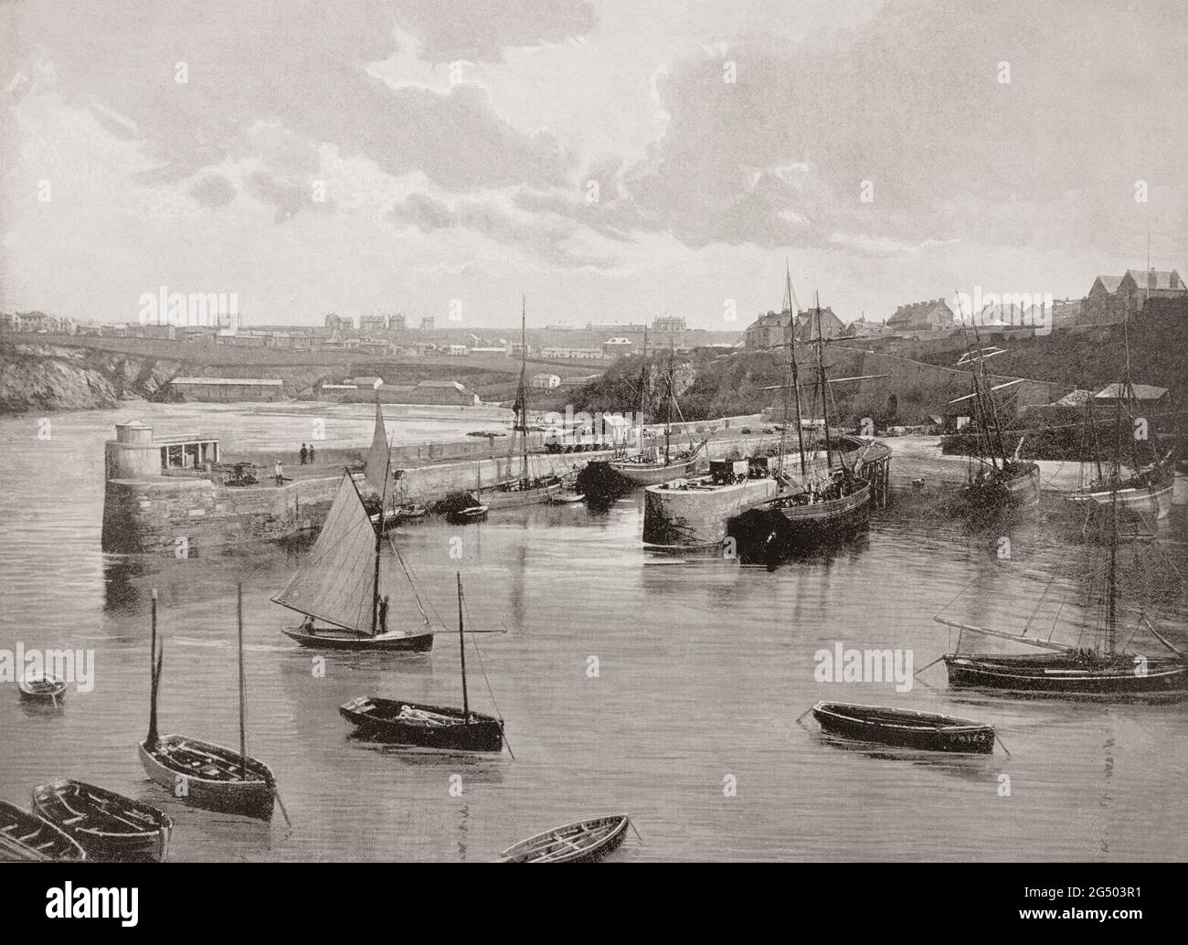 A late 19th century view of the harbour, built in the 1830s, in Newquay, a town on the north coast in Cornwall, in the south west of England. The fishing port and seaside resort on the North Atlantic coast of Cornwall, England is now a popular surfing centre. Stock Photo