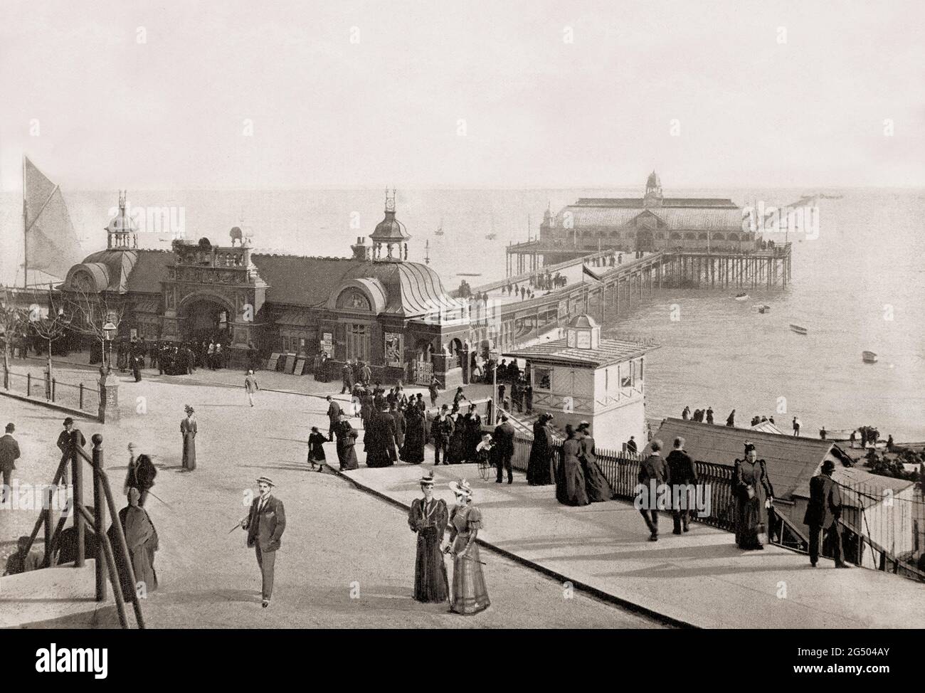 A late 19th century view of the world's longest pleasure pier, built in 1830 and stretching some 1.34 miles (2.16 km) from shore in Southend-on-Sea aka Southend, in Essex, England on the north side of the Thames Estuary. Originally a few poor fishermen's huts and farms at the southern end of the village of Prittlewell it became ta seaside resort grew after a visit from Princess Caroline of Brunswick. Stock Photo