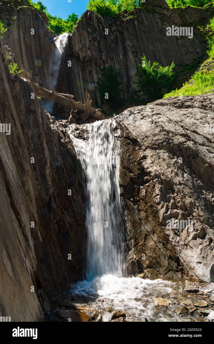 Beautiful waterfall in the mountains Stock Photo