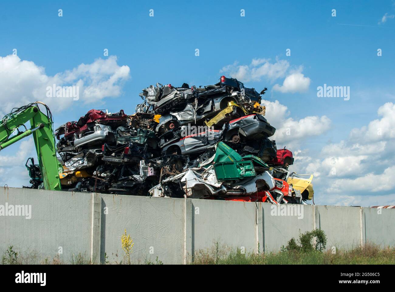 Pile of crushed junk cars on scrapyard Stock Photo Alamy