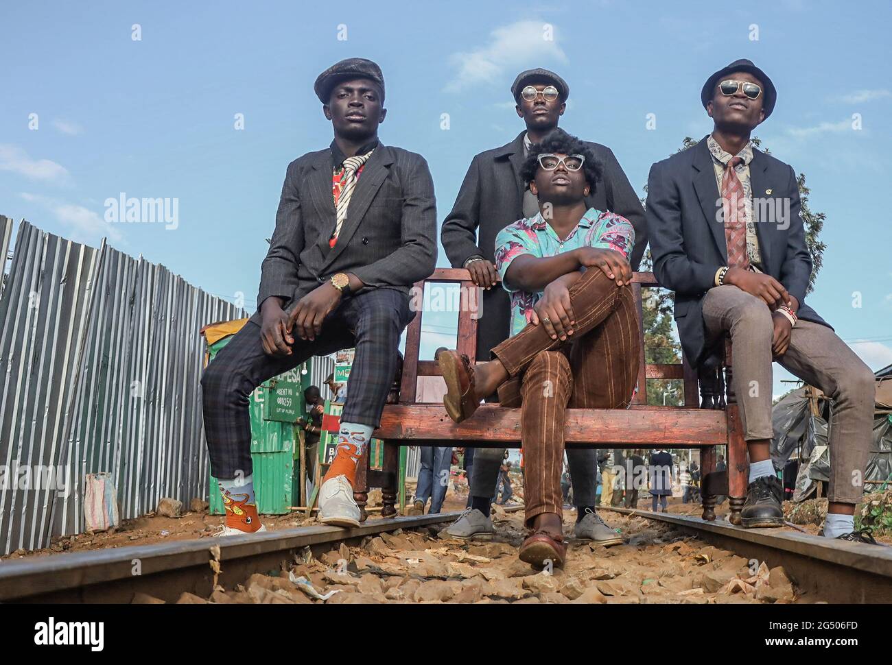 A group of street models match through the streets in Kibera Slums dressed in their classic vintage outfits. Modern fashion is now becoming a new trend practiced by different individuals in the A group of street models match through the streets in Kibera Slums dressed in their classic vintage outfits. Modern fashion is now becoming a new trend practiced by different individuals in the