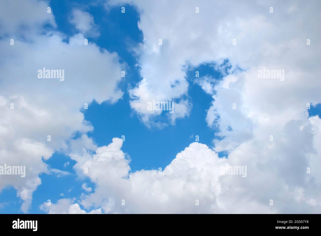 Cloudy blue sky background photo Stock Photo - Alamy