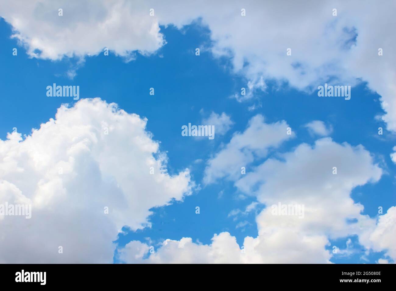 Cloudy blue sky background photo Stock Photo - Alamy