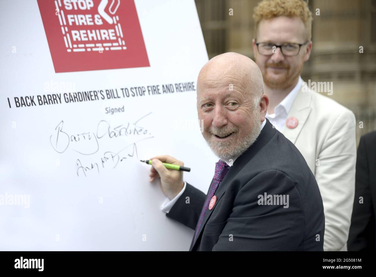 Andy McDonald MP (Labour: Middlesborough) Shadow Secretary of State for Employment Rights -  and Lloyd Russell-Moyle MP (behind) at an event to public Stock Photo