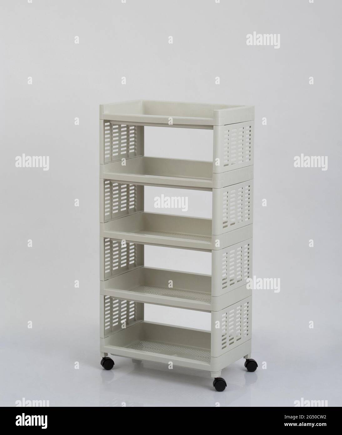 Empty white plastic shelves rack with wheels isolated on white background  Stock Photo - Alamy
