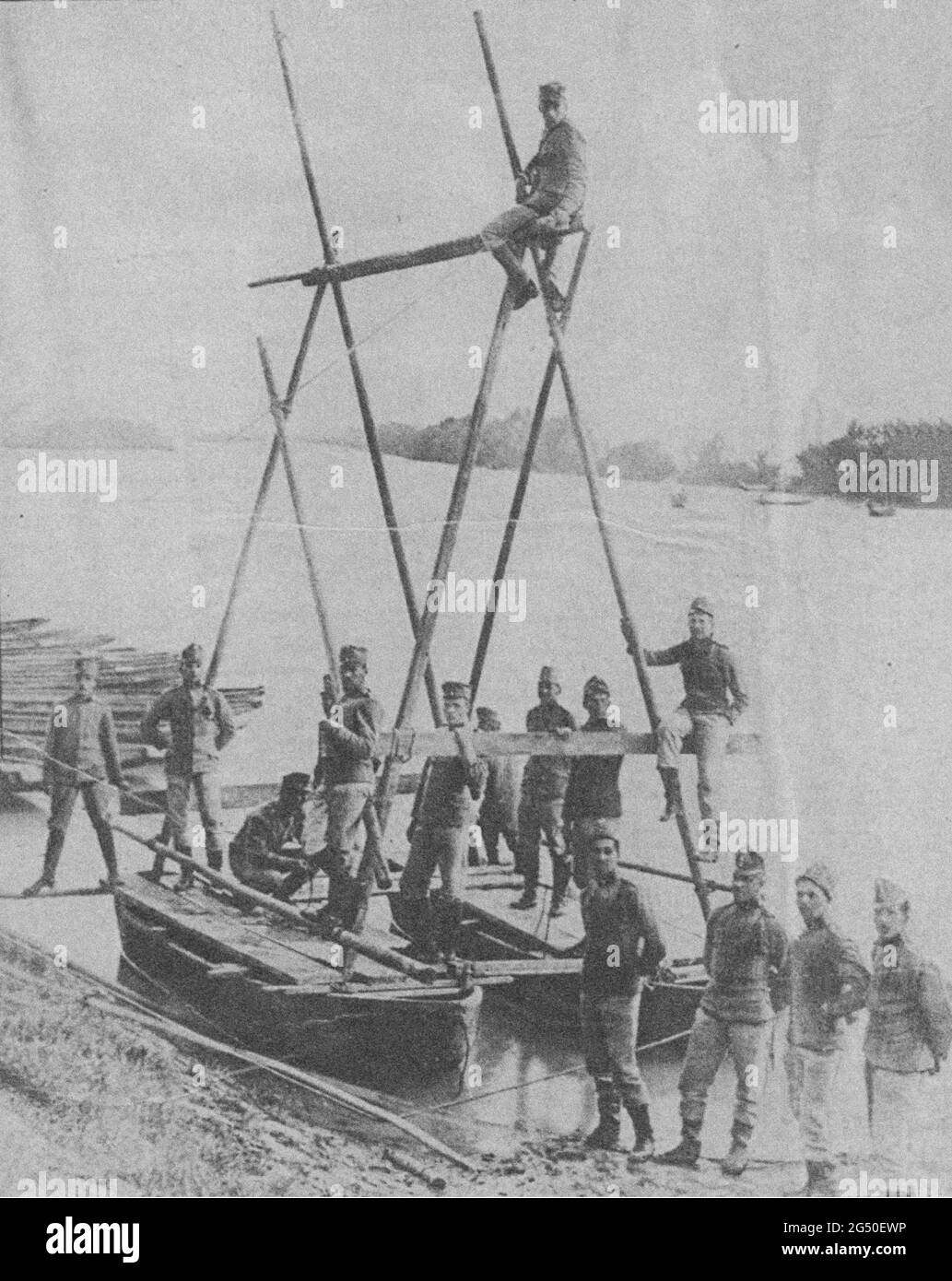 Vintage photo from World War I period. Austrian sappers build a mobile crossing over the Danube. Austro-Hungarian Empire. 1914 Stock Photo