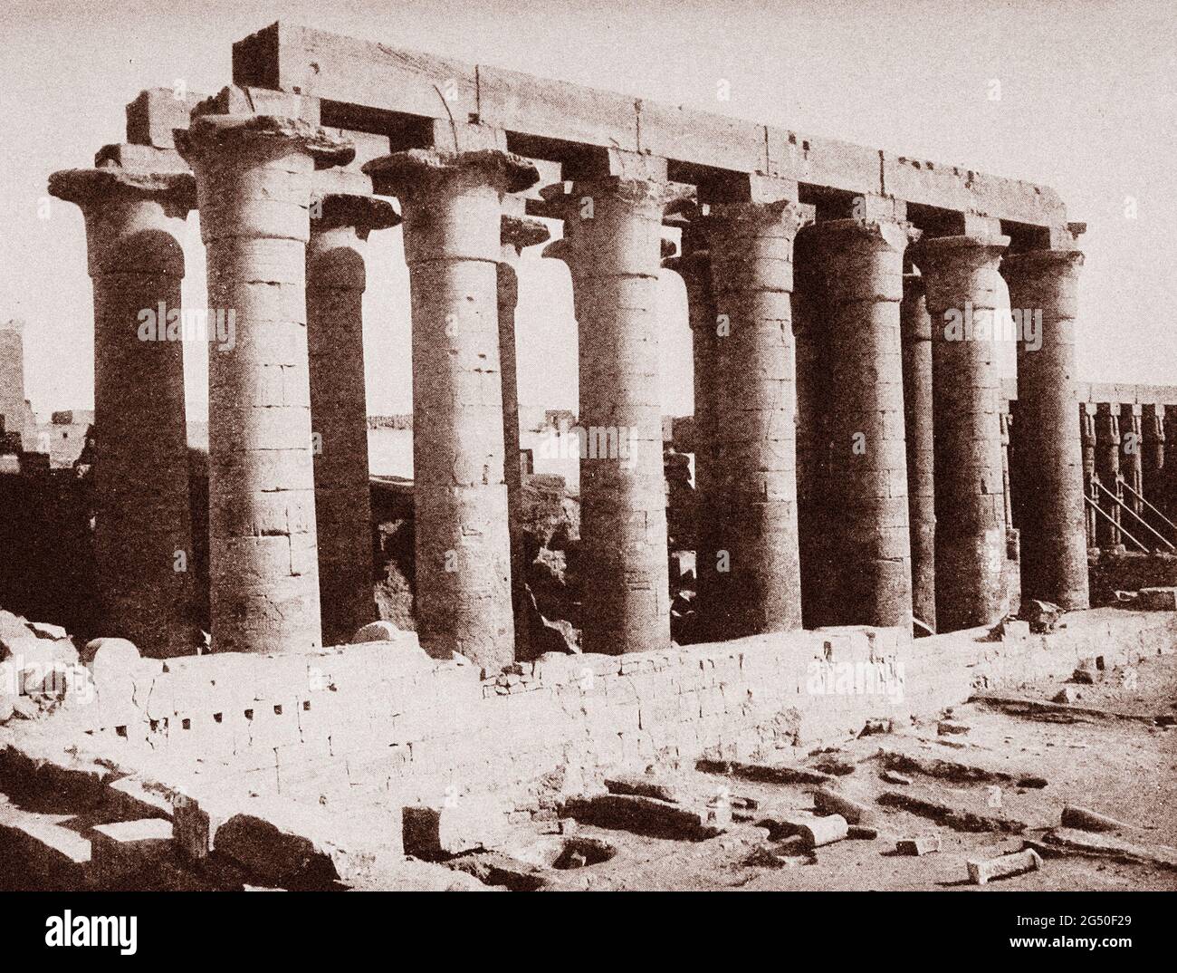 Ancient Egypt. The Empire period. Columns of the Nave of Amenhotep III's unfinished hall. 1912  The side aisles and smaller columns should have been r Stock Photo