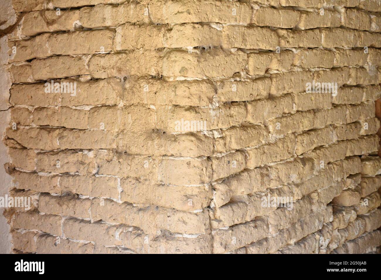 Building corner built with mud bricks, traditional style. Buimanco village, Soria province, Spain. Stock Photo