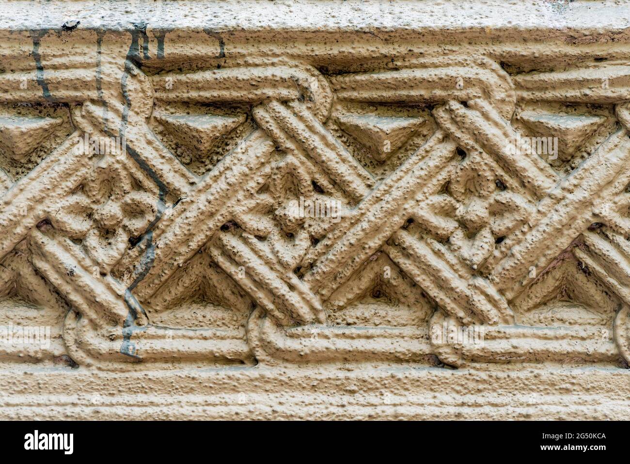 Elements of architectural decoration of buildings, plaster stucco, wall texture, plaster molding and patterns. Stock Photo