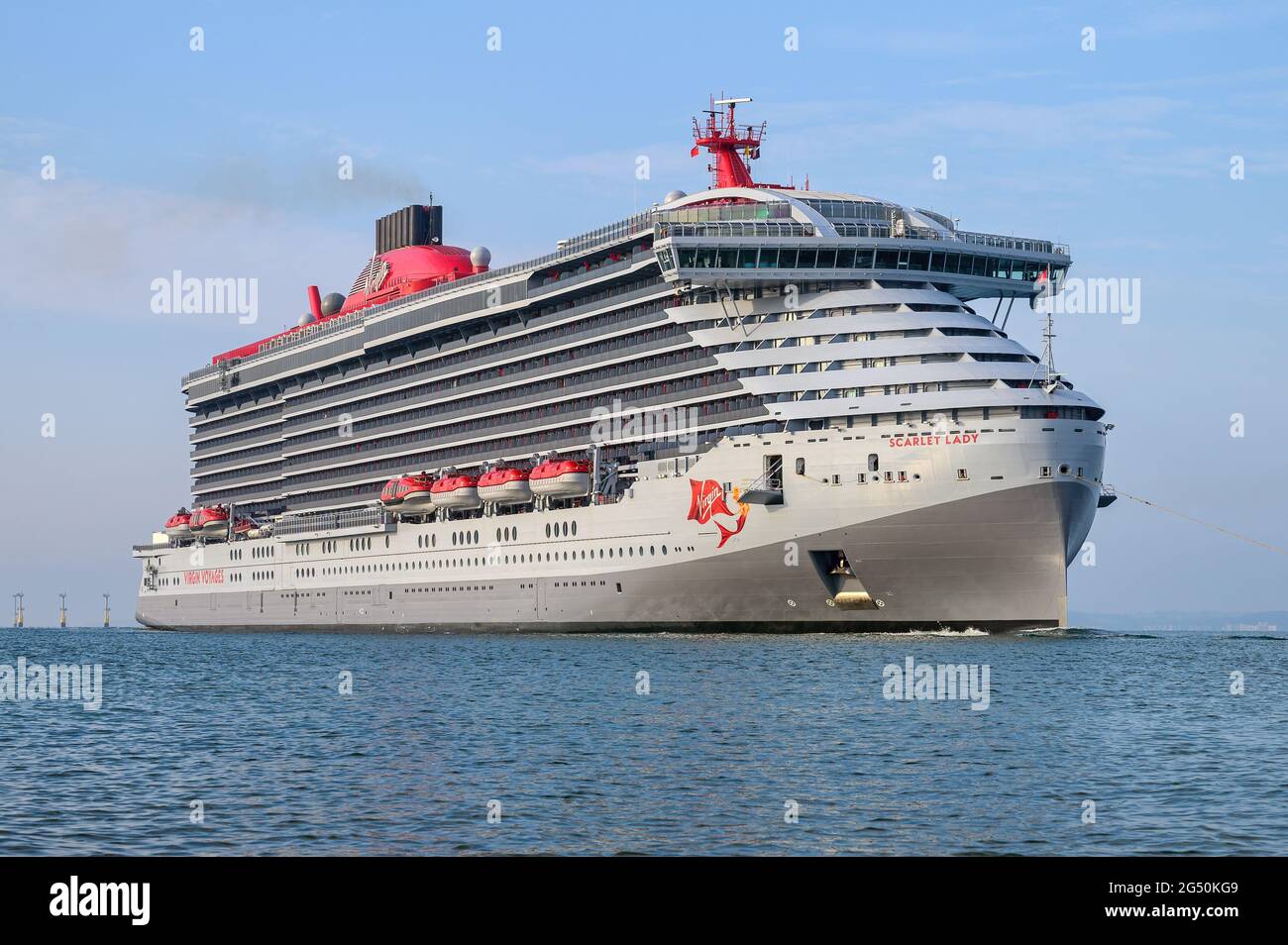 Virgin Voyages new cruise ship Scarlet Lady navigating the channel in to Portsmouth Harbour - June 2021 Stock Photo
