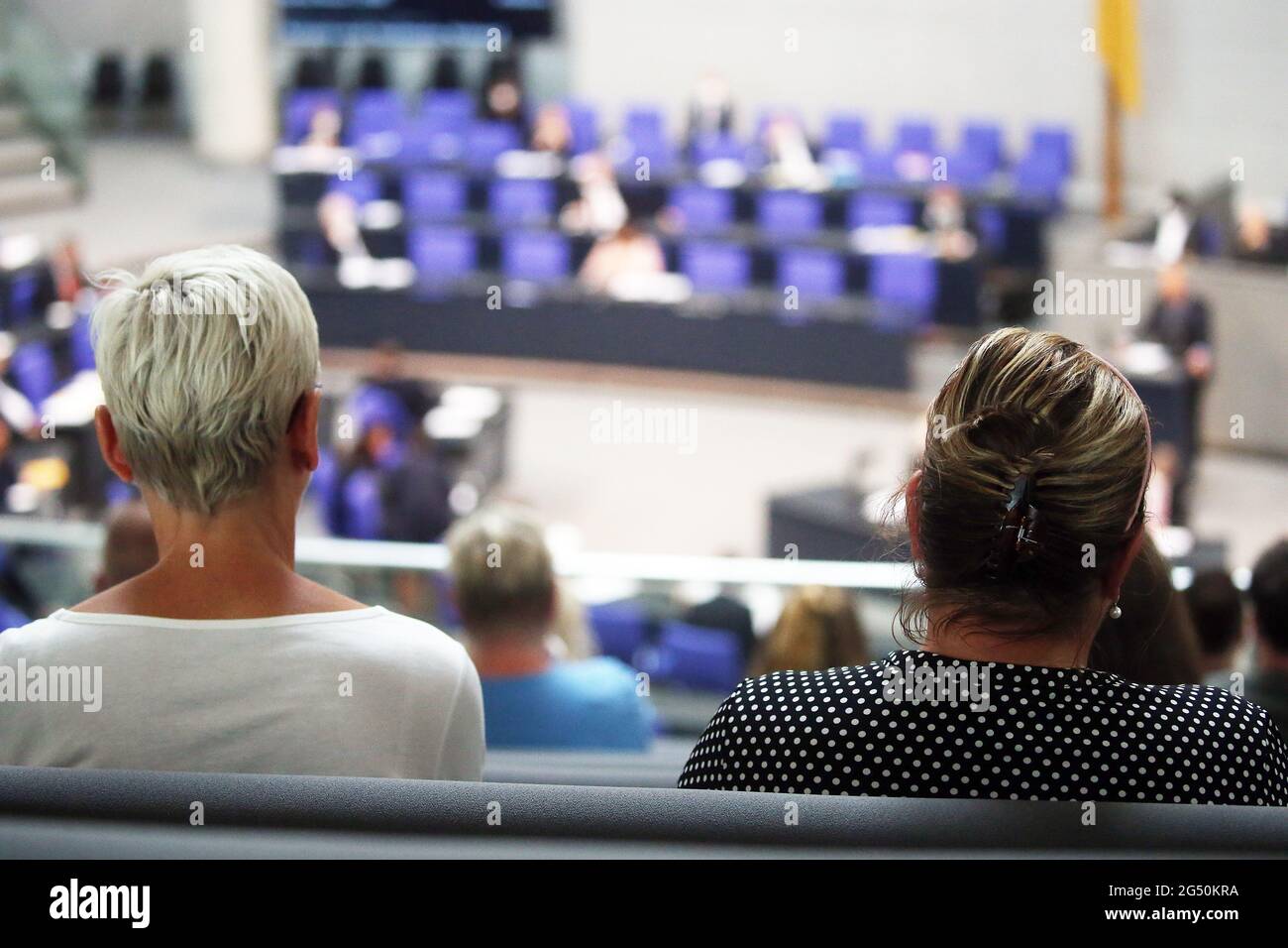 Berlin, Germany. 24th June, 2021. Relatives and survivors of the victims of the Breitscheid Square attack follow the debate on the Amri investigation committee in the Bundestag. Credit: Wolfgang Kumm/dpa/Alamy Live News Stock Photo