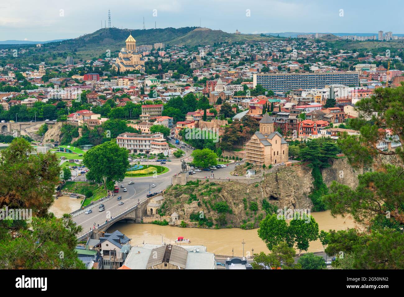 Tbilisi, Georgia. Panoramic beautiful picture of Cityscape Of Summer Old Town. Stock Photo