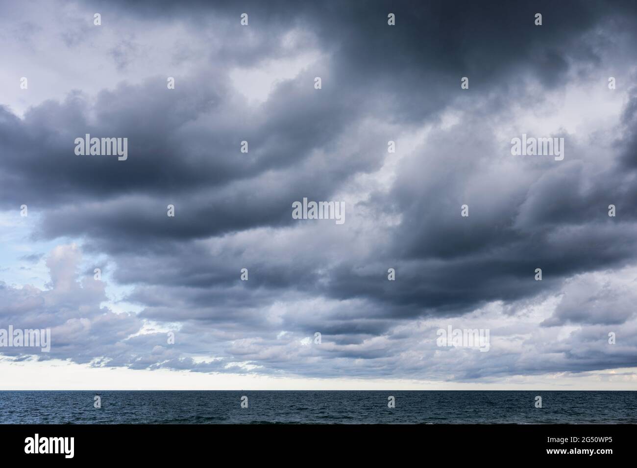 Dark blue sky over tropical hi-res stock photography and images - Alamy