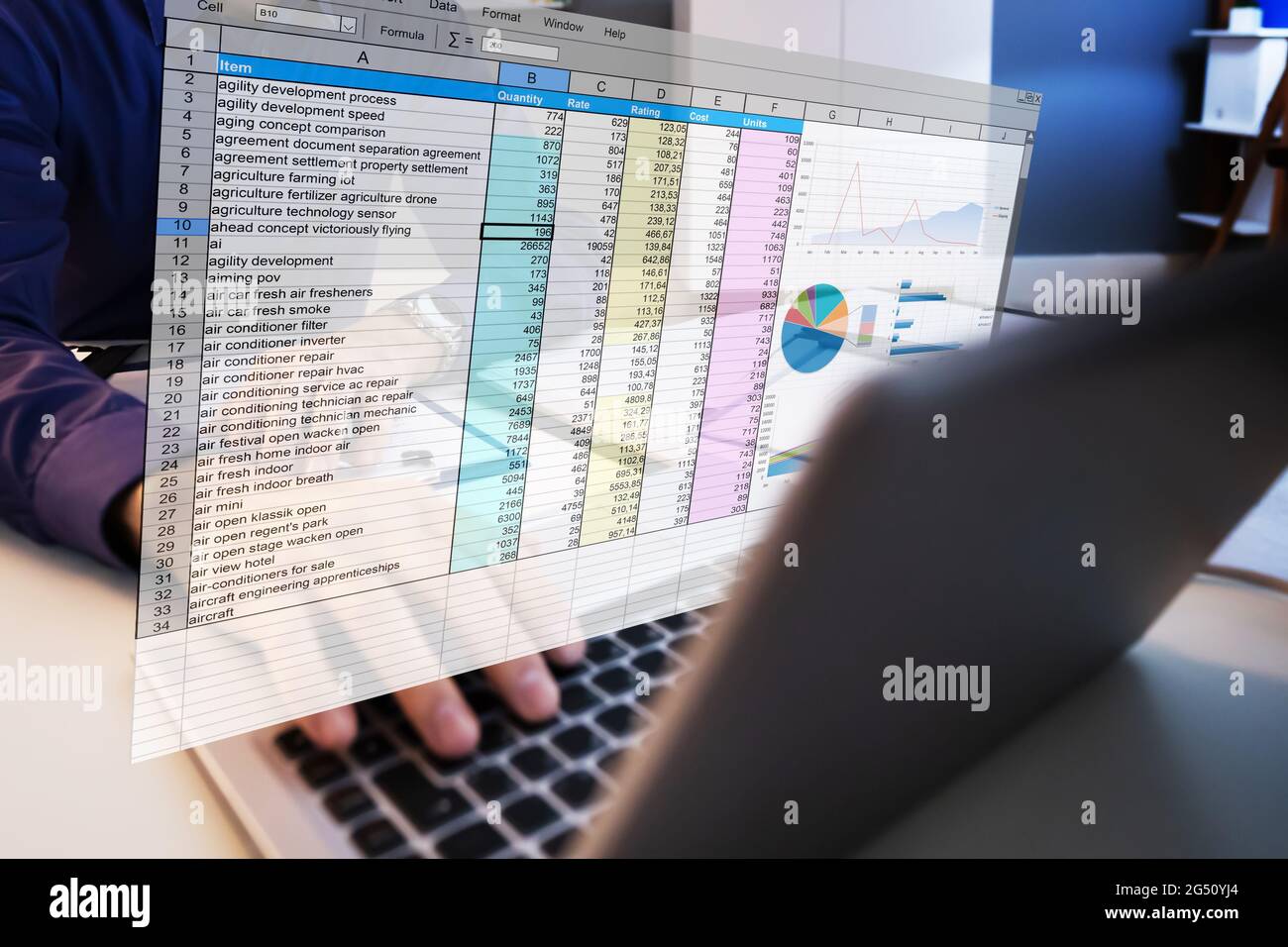Data Analyst Auditor Employee Using Spreadsheet On Computer Stock Photo