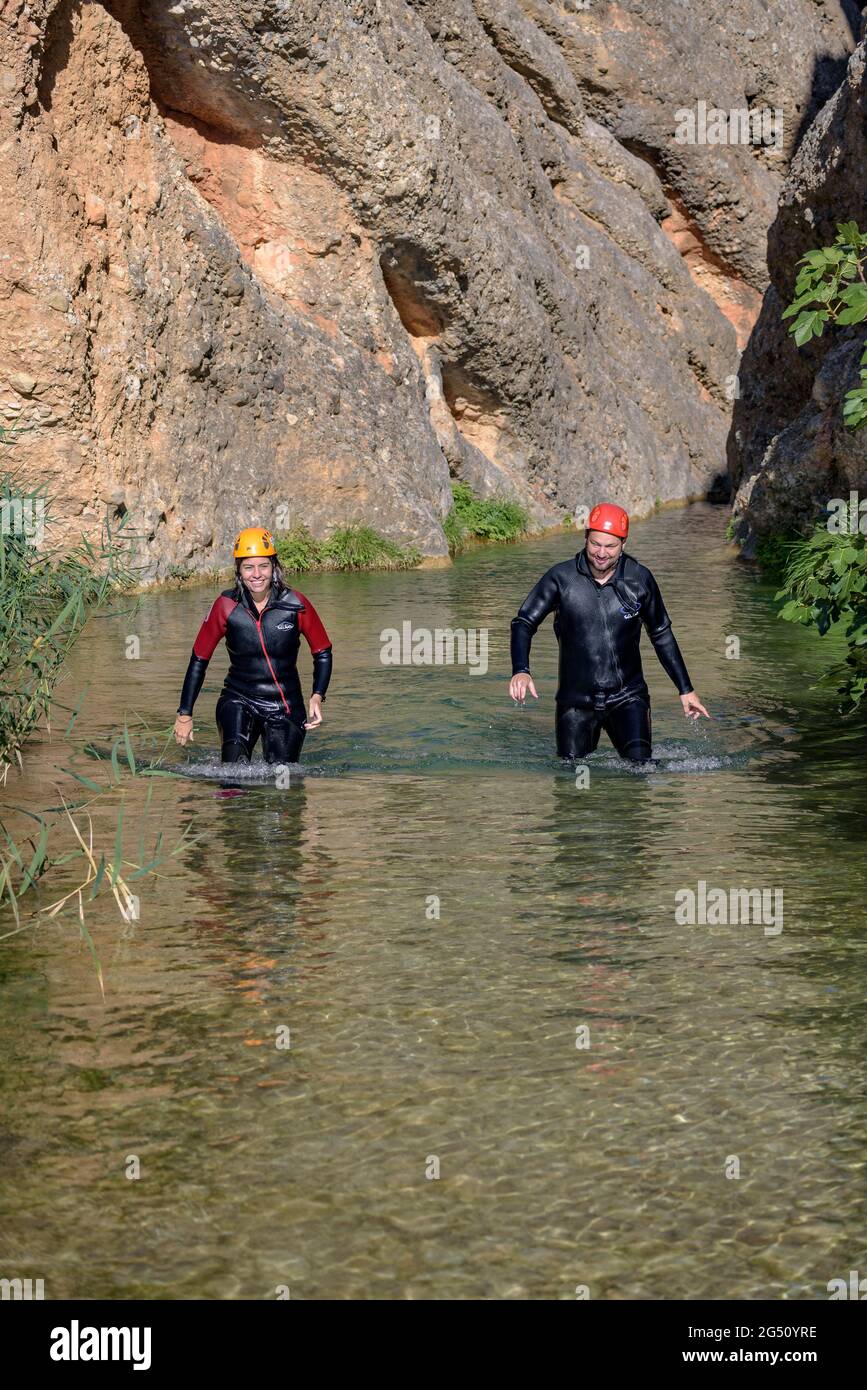 Arriving at the final point of the canyoning descent through the Canaletes river ravine (Els Ports Natural Park, Tarragona, Catalonia, Spain) Stock Photo