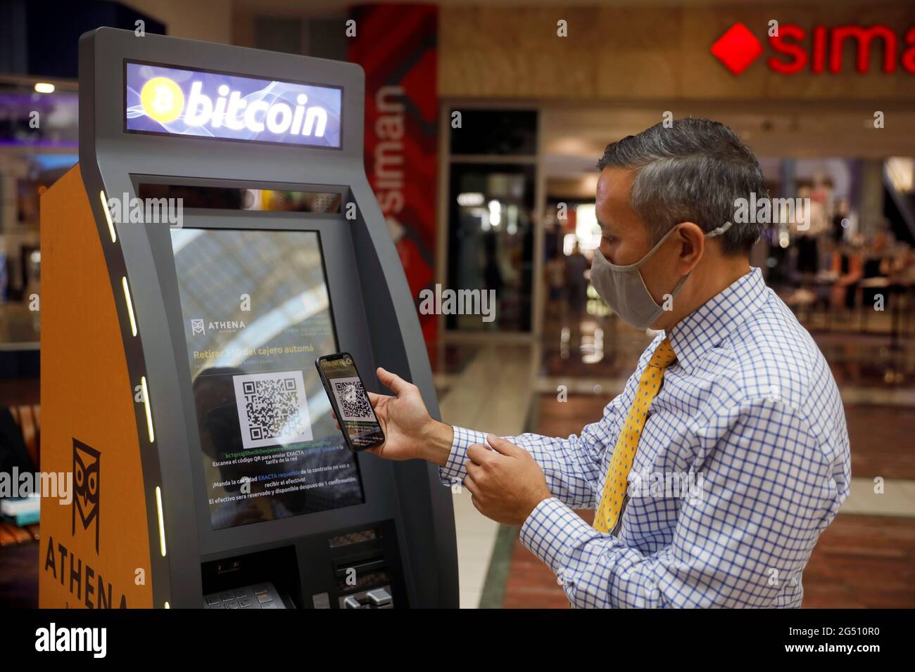 Eric Gravengaard Ceo Of Athena Bitcoin Inc Shows The Use Of An Atm Prior To A News Conference During The Presentation Of A Bitcoin Atm In San Salvador El Salvador June 24
