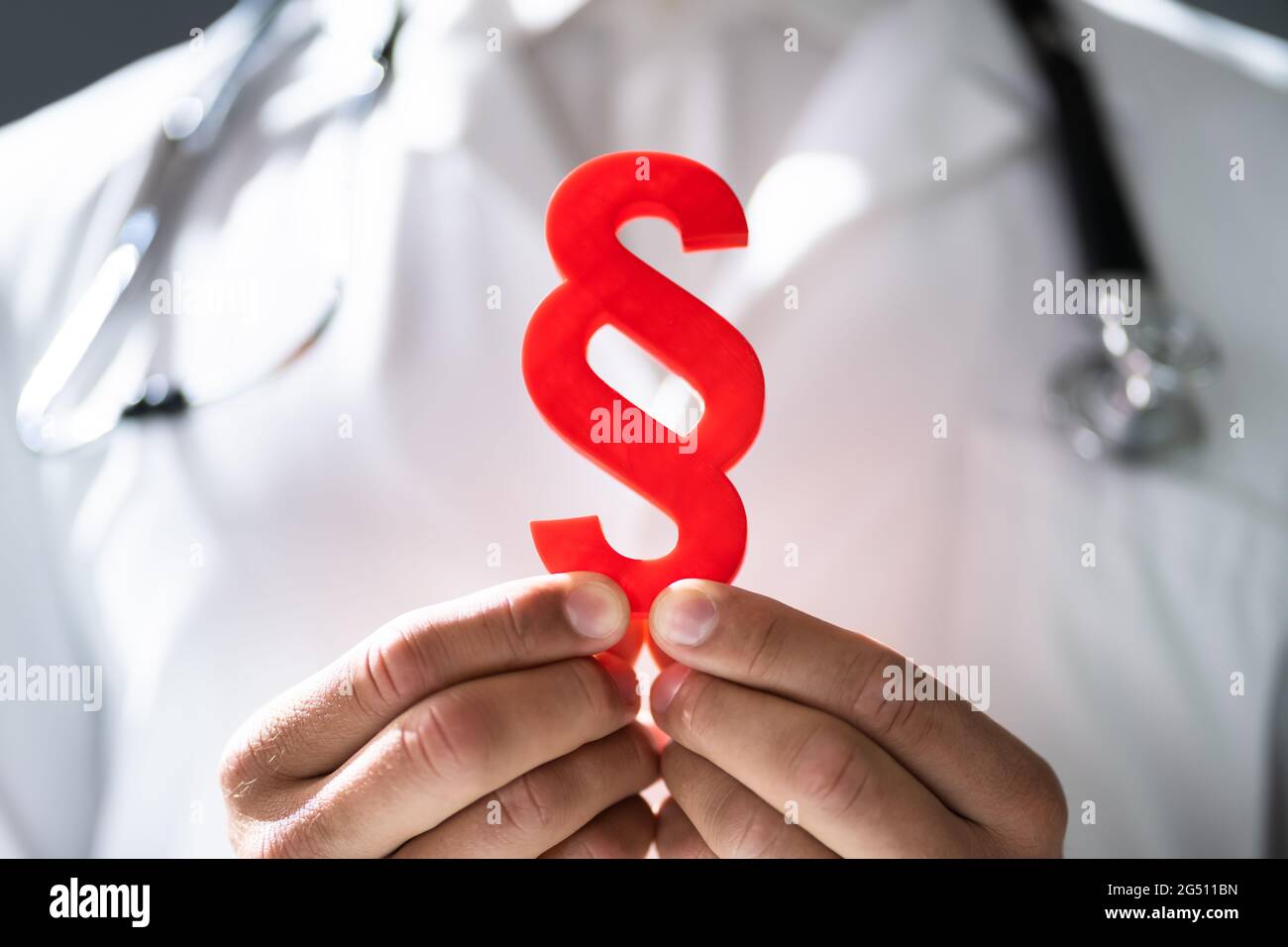 Medical Malpractice In Healthcare. Stethoscope And Paragraph Stock Photo