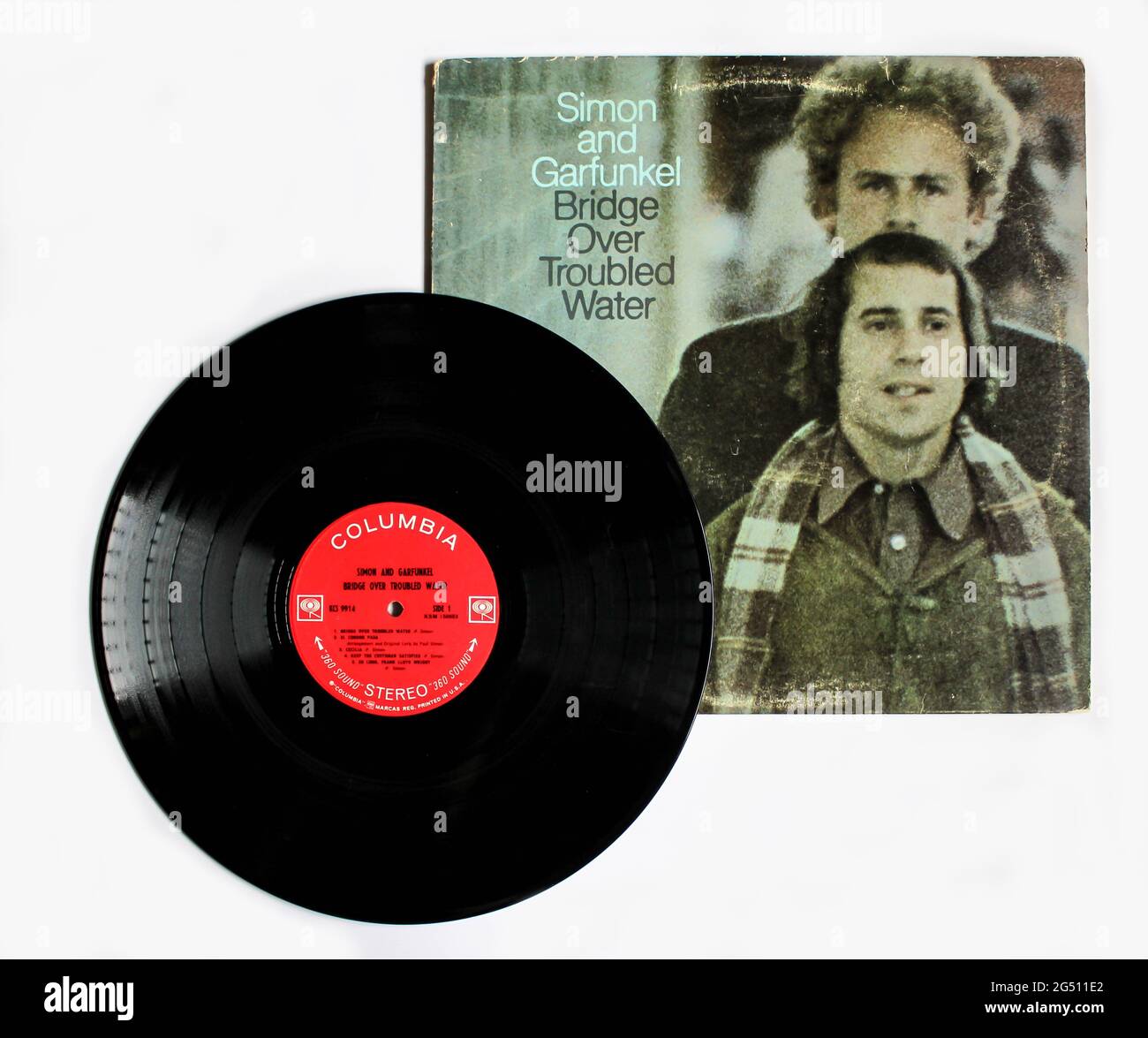 Folk rock singers Simon and Garfunkel music album on vinyl record LP disc.  Titled Bridge over troubled water. Paul Simon and Art Garfunkel album cover  Stock Photo - Alamy