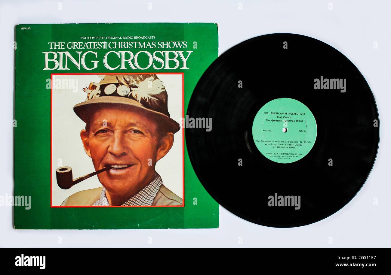 American singer-songwriter, actor and comedian Bing Crosby on vinyl record LP disc. Titled: Bing Crosby – The Greatest Christmas Shows album cover Stock Photo