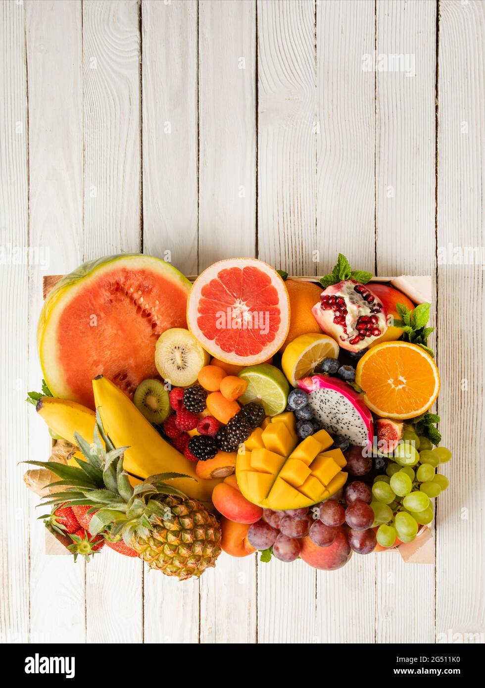 The set of tropical fruits stacked for delivery Stock Photo - Alamy