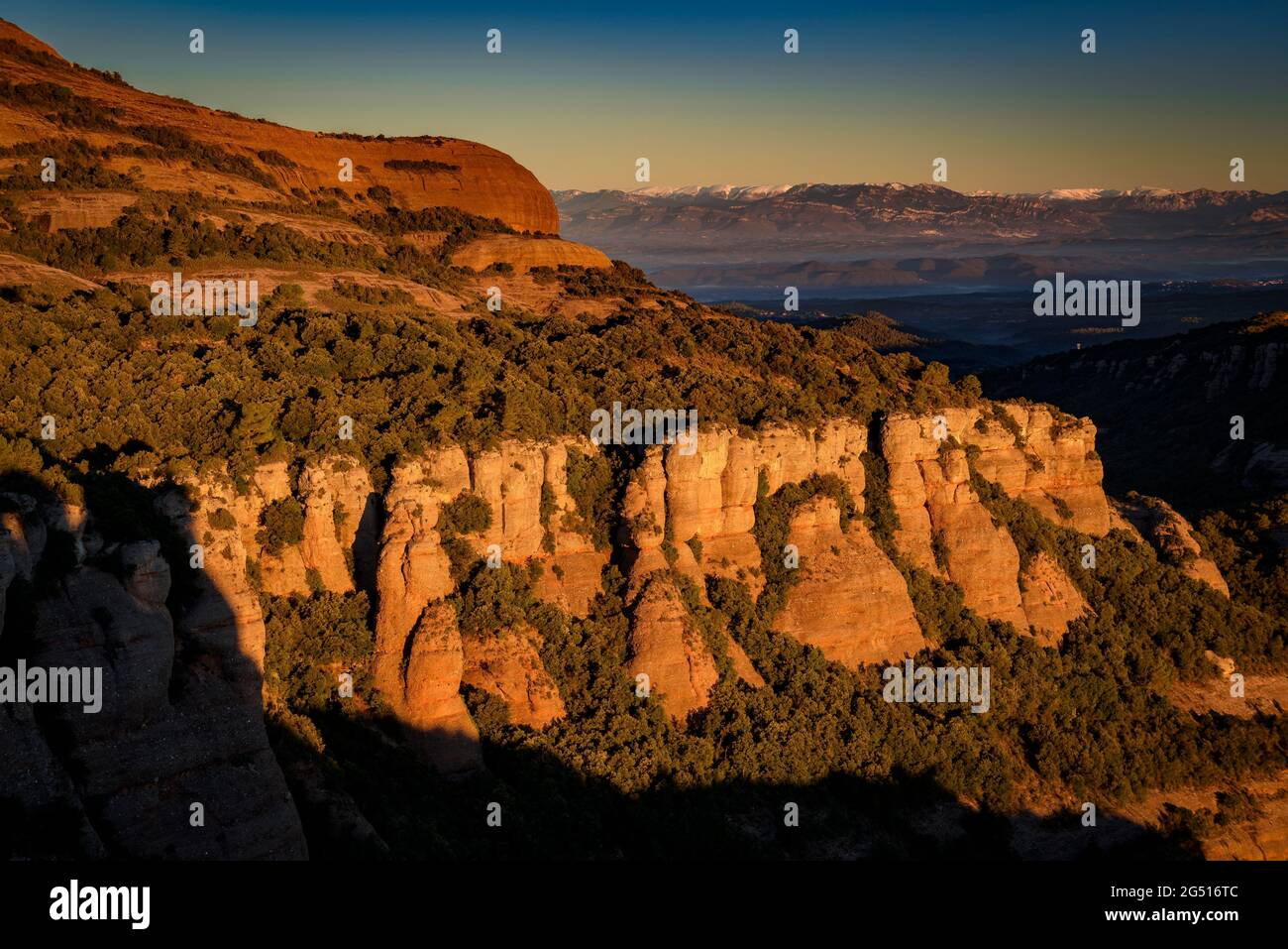 Sunrise at the Fogueroses cliffs, on the Montcau east face, within the Sant Llorenç del Munt i l'Obac Natural Park (Barcelona, Catalonia, Spain) Stock Photo