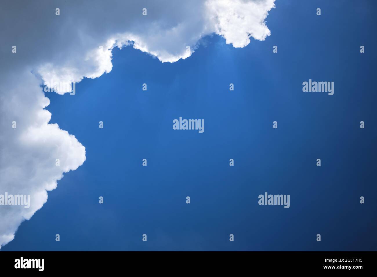 Thick white clouds in the blue sky hi-res stock photography and images -  Alamy