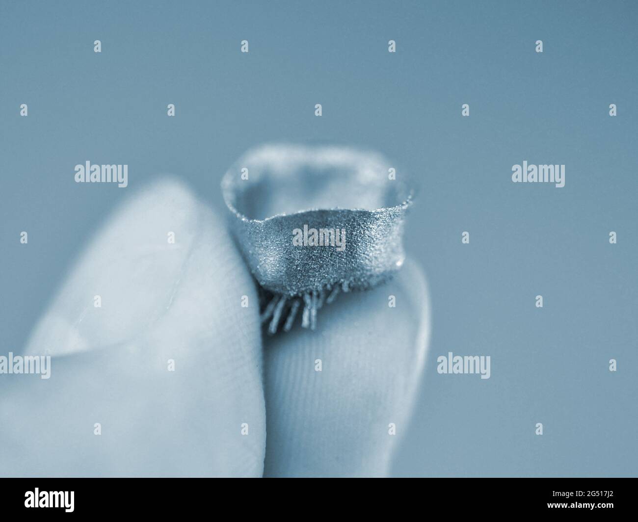 Small object printed on metal 3d printer macro. Stock Photo