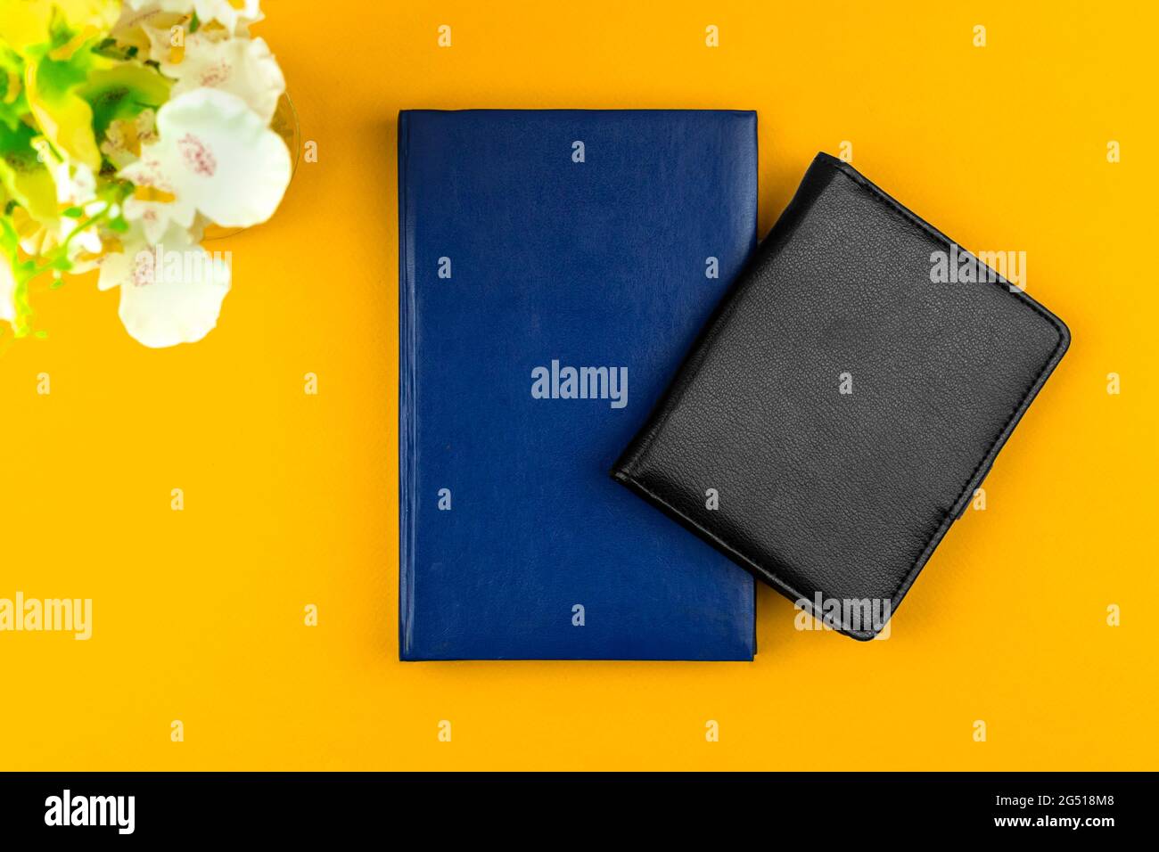 Freelancer workspace composition, flat lay background with leather notebooks on the table, mockup concept Stock Photo