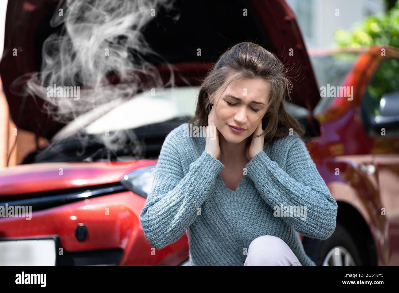 Neck Pain After Car Accident. Injury Claim And Stress Stock Photo