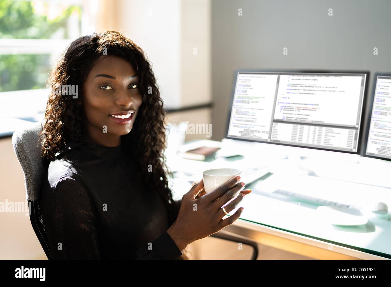 African American Woman Programmer. Girl Coding On Computer Stock Photo ...