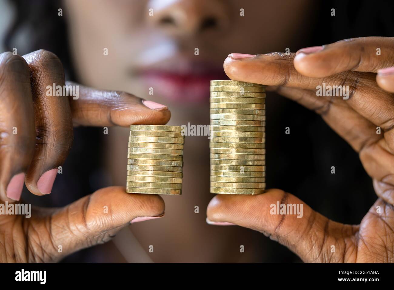 Compare Wage Gap And Tax Differences. Equal Pay Stock Photo