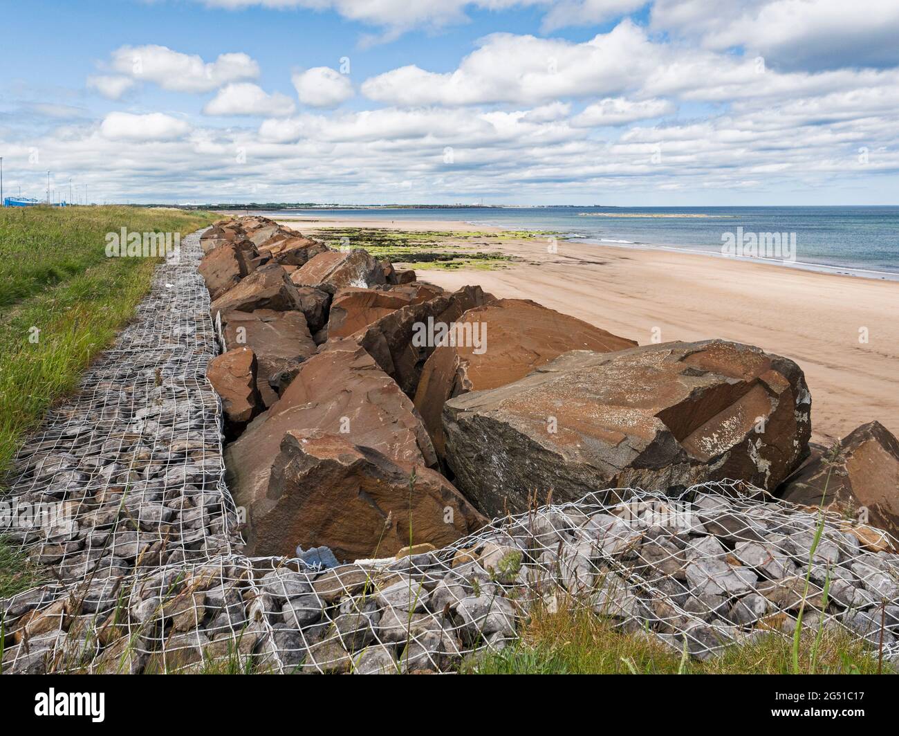 Boulders used to help reduce erosion at North Blyth to Cambois, Northumberland, UK Stock Photo