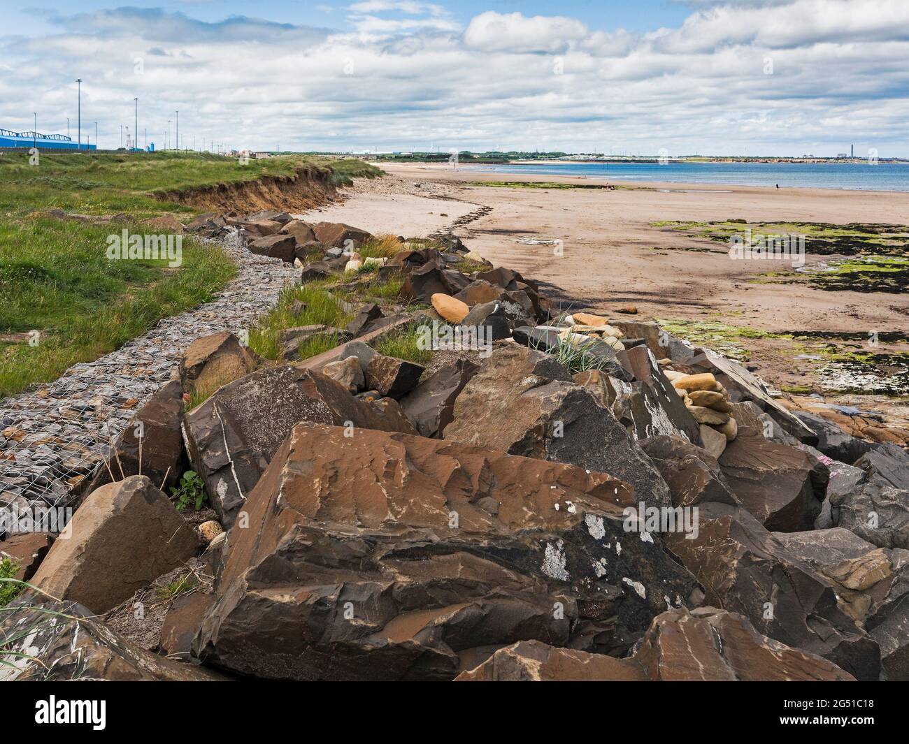 Boulders used to help reduce erosion at North Blyth to Cambois, Northumberland, UK Stock Photo