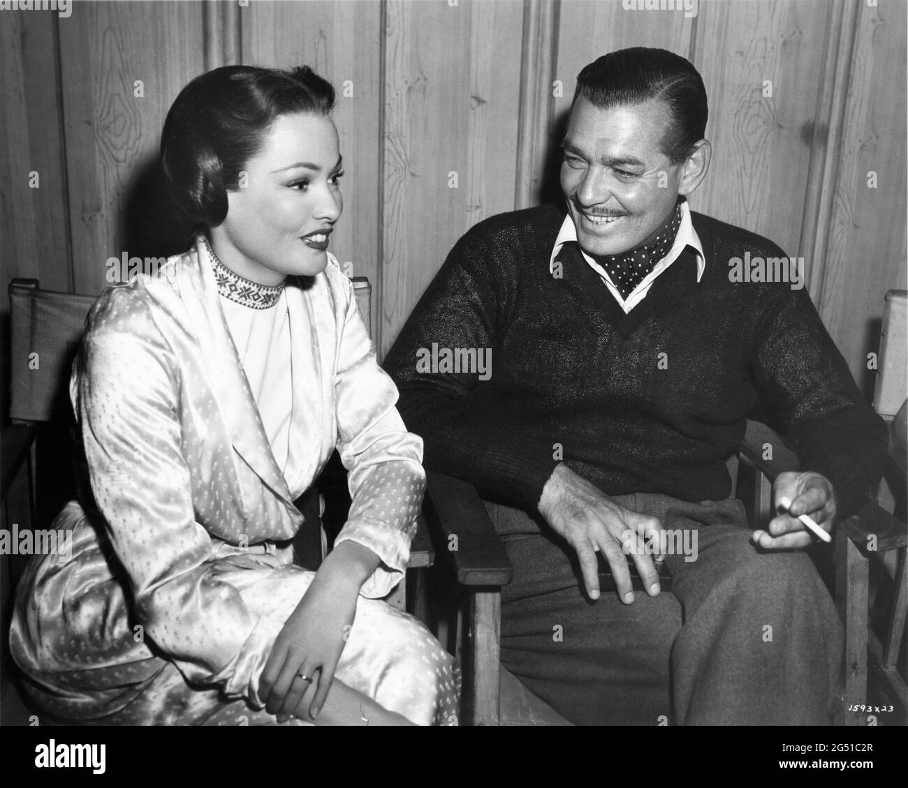 GENE TIERNEY and CLARK GABLE on set candid at MGM British Studios at Boreham Wood during filming of NEVER LET ME GO 1953 director DELMER DAVES from novel Come The Dawn by Paul Winterton producer Clarence Brown Metro Goldwyn Mayer Stock Photo