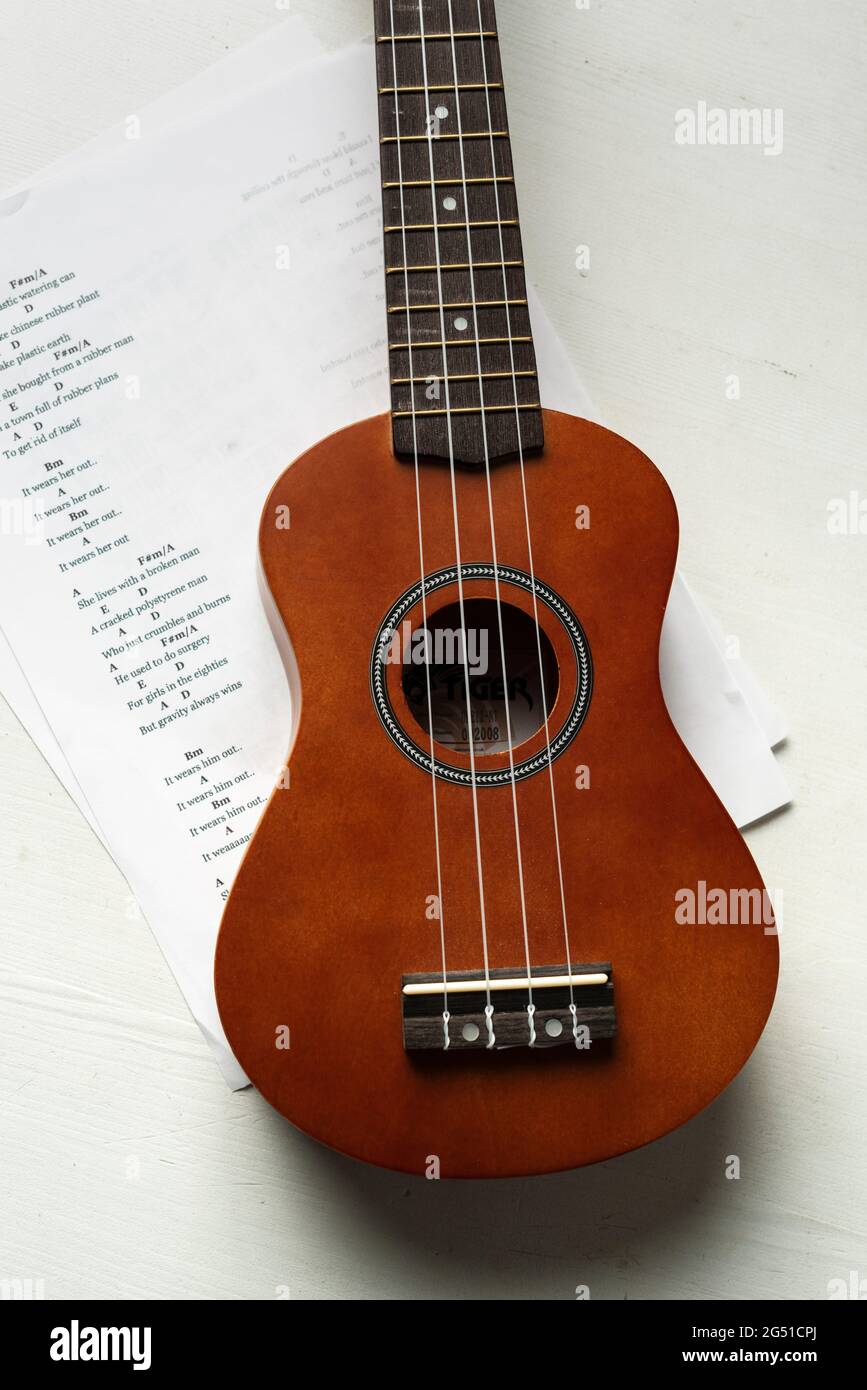 Acoustic ukulele and chord chards Stock Photo