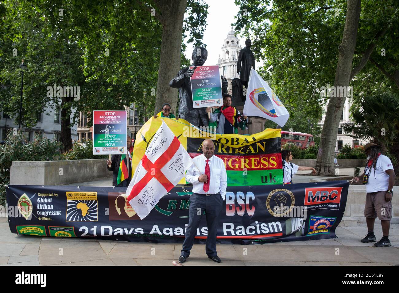 London Uk 23rd June 21 Windrush Campaigners Including Co Founder Of Windrush Defenders Legal C I C Anthony Brown C Protest In Front Of The Statue Of Nelson Mandela In Parliament Square They Had Marched