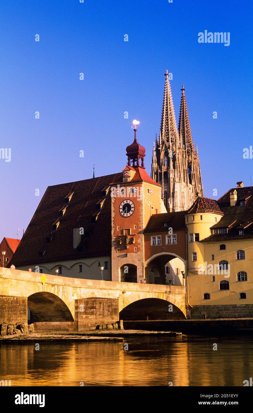 Arch bridge over Danube river and Regensburg Cathedral, Regensburg, Bavaria, Germany Stock Photo
