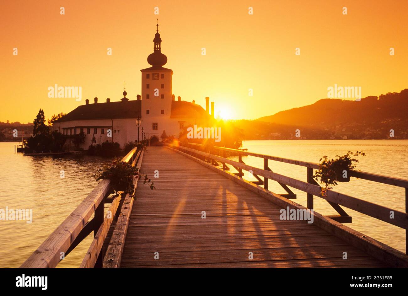 Schloss Ort and Traunsee Lake at sunset, Gmunden, Austria Stock Photo