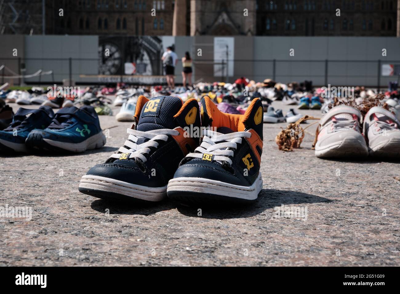 Children shoes at Memorial in tribute to aboriginal children whose remain found in Residential Schools in Canada.  Parliament Hill, Ottawa Stock Photo
