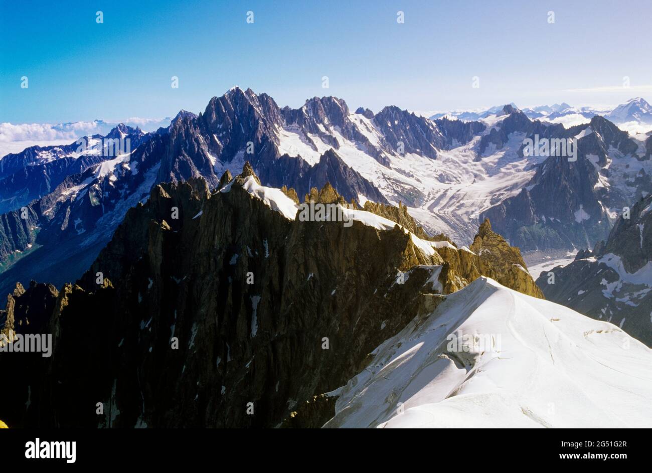 View of mountains in winter in Mont Blanc massif in Alps from Aiguille du Midi, Haute-Savoie, France Stock Photo