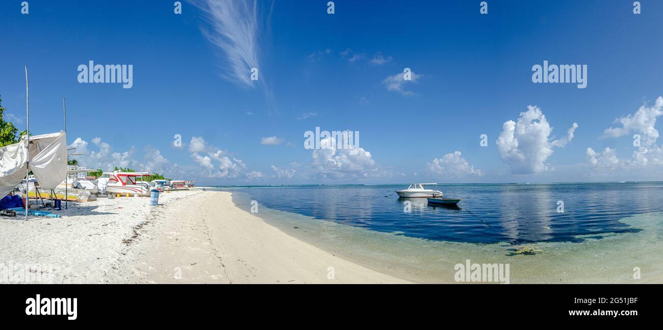 Panorama view of the beach in Maafushi island, Maldives. There are