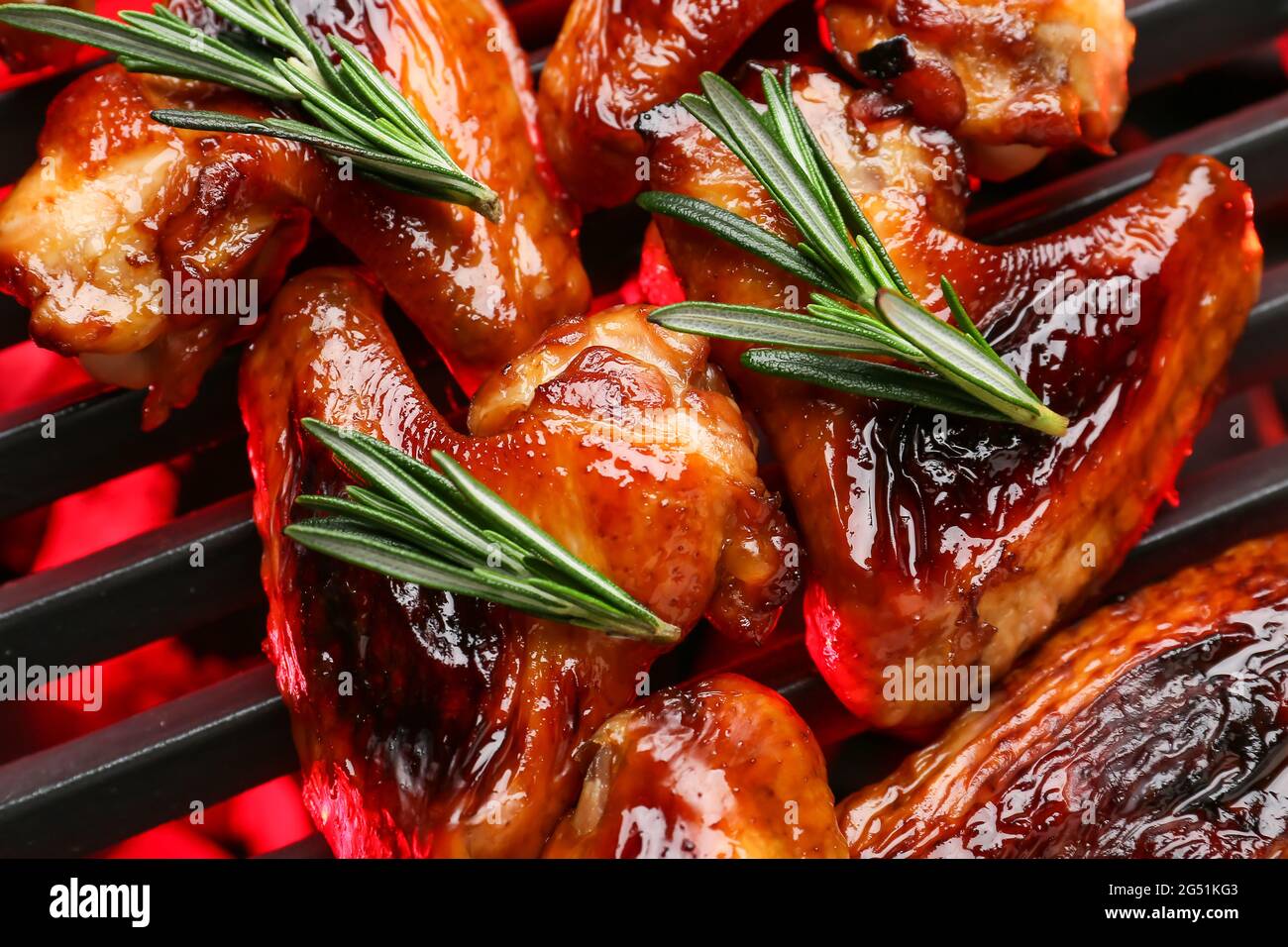 Roasted chicken wings cooking on grill Stock Photo Alamy