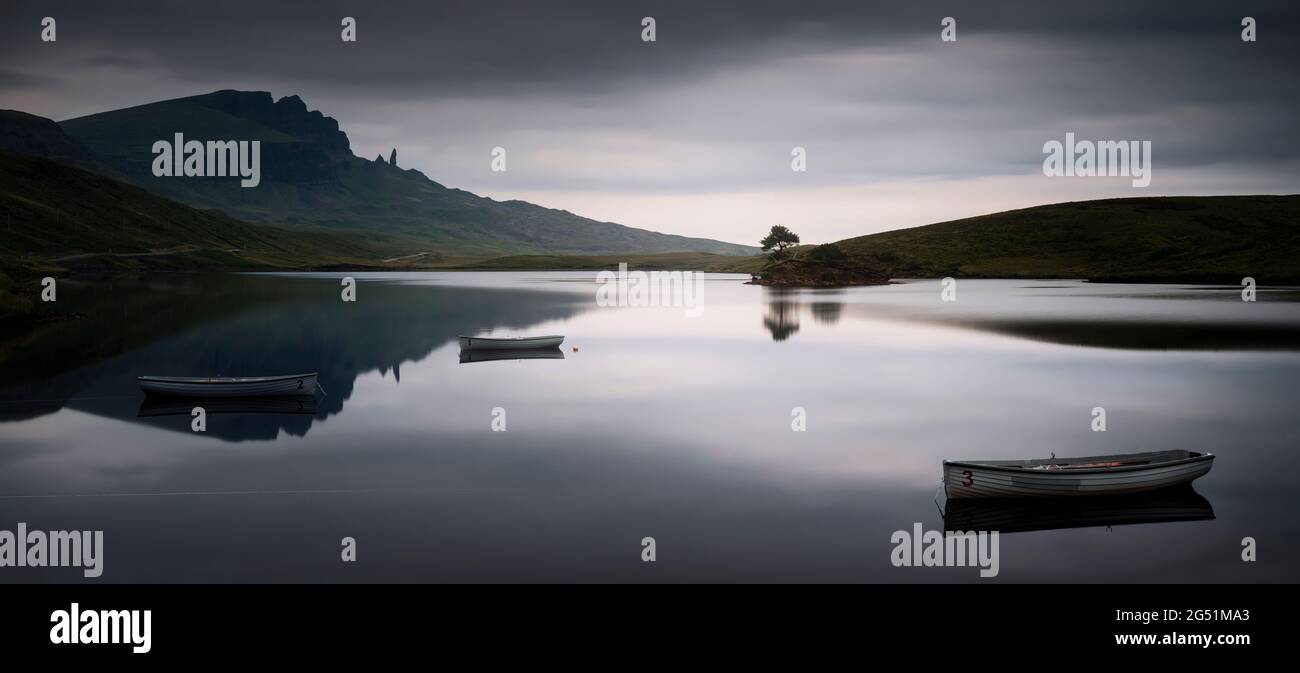 Old Man of Storr reflecting in Loch Fada, Isle of Skye, Scotland, UK Stock Photo